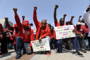 Protesters-rally-for-Colin-Kaepernick-outside-Ford-Field-Detroit-091017-by-Jose-Juarez-AP-web-300x200, Taking a stand: Black athletes revive protest in the sports world, Culture Currents 