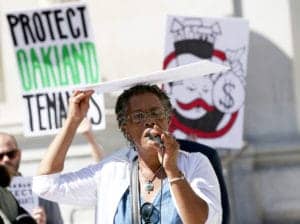 Oakland-tenant-Josephine-Hardy-rallies-for-tenants’-rights-in-front-of-City-Hall-Oakland-092617-by-Anda-Chu-Bay-Area-News-Group-300x224, Signature gatherers for anti-rent control petition linked to CAA charged with fraud, Local News & Views 