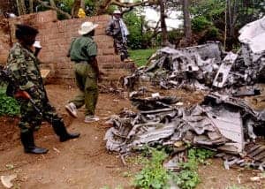 Rwanda-Patriotic-Front-RPF-soldier-rebels-inspect-Pres.-Habyarimana-plane-wreckage-052694-by-Corinne-Dufka-Reuters-300x214, The crime that turned Central Africa into a vast killing ground, World News & Views 