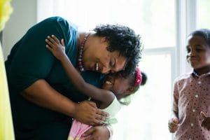 Stacey-Abrams-hugs-lil-Black-girl-by-Kevin-D.-Liles-300x200, Vote Stacey Abrams for governor to build a Georgia where everyone has the freedom and opportunity to thrive, News & Views 