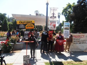 Indigenous-leader-Morning-Star-Gali-speaks-at-Poor-People-Campaign-action-at-Capitol-in-Sacramento-0518-by-Jahahara-web-300x225, The joys, and CRIMES, of Juneteenth, Culture Currents 