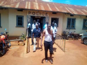 Ronald-Muwanga-aka-Ronnie-Ronnie-walks-barefoot-from-police-stn-after-torture-081118-300x225, Uganda Krip-Hop Nation journalist Ronnie Ronnie beaten, tortured by police, recovering at home, World News & Views 