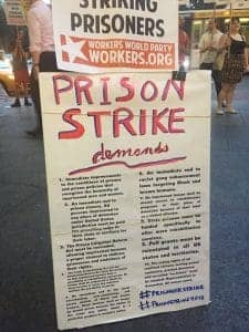 Prison-Strike-Demands-picket-sign-at-protest-082218-web-225x300, The deafening drumbeat of the unfree, Behind Enemy Lines 