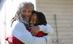 Mike-Africa-Sr.-embraces-wife-Debbie-Africa-on-release-Philly-102318-by-Tommy-Oliver-@producertommy-web-300x180, Mike Africa – FREE!, Behind Enemy Lines 