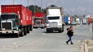 West-Oakland-trucks-child-by-Kim-Komenich3-300x169, Toxic tour of West Oakland, Local News & Views 