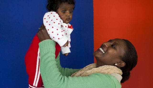 Israeli-Ethiopian-mother-and-baby-by-Tomer-Appelbaum, Israel: Ethiopian Jews’ birth rate falls 50%, World News & Views 