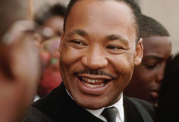 Martin-Luther-King-smiles-w-church-family-at-news-he-won-Nobel-Peace-Prize-110864-by-Flip-Schulke-Corbis, Martin Luther King Jr., John Carlos and the boycott that wasn’t, ‘an Olympics without Black athletes’, Culture Currents 