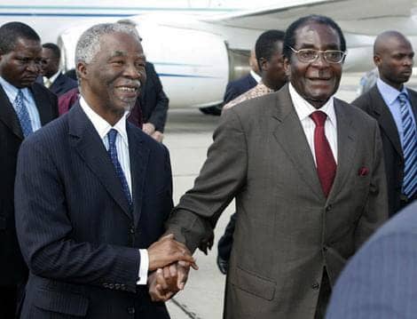 Zimbabwe-President-Robert-Mugabe-greets-South-Africa-President-Thabo-Mbeki-at-Harare-airport-041208-by-Reuters, Zimbabwe delayed land reform to save South Africa from prolonged Apartheid, World News & Views 