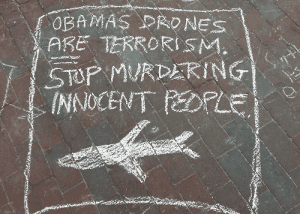 Obamas-drones-ARE-terrorism-sidewalk-chalk-sign, Have we sold our souls by turning a blind eye to Obama’s drones?, News & Views 