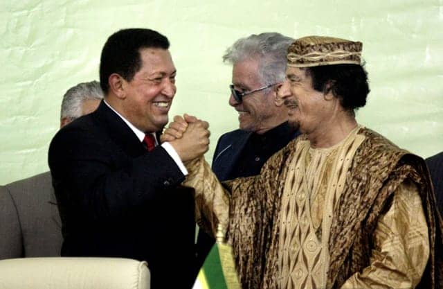 Hugo-Chavez-clasps-hands-with-Muammar-Qaddafi, ‘There is no turning back’: We salute a great freedom fighter – Comandante Hugo Chavez Frias, World News & Views 