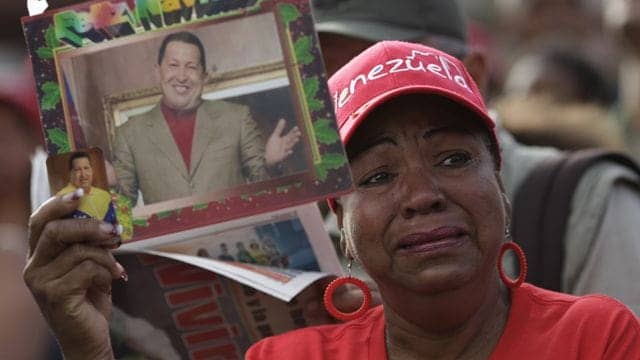 Hugo-Chavez-supporter-cries-outside-Military-Hosp-day-after-he-died-there-030613-by-AFP, Chavez’ legacy, African solidarity and the African American people, World News & Views 