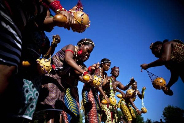 Chedepo-Grebo-Cultural-Festival-dancing-with-gourds-at-Tarlesson-Farm-by-Carl-Costas, Liberian family finds agricultural refuge in California, invites public to African cultural festival July 7, Culture Currents 