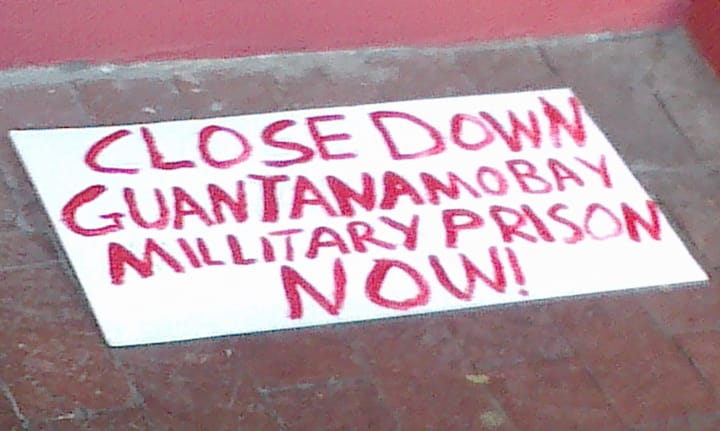 NObama-Coalition-Cape-Town-South-Africa-protest-sign-Close-down-Guantanamo-Bay-military-prison-now-062213, NObama! South Africans prepare to protest Obama visit, World News & Views 