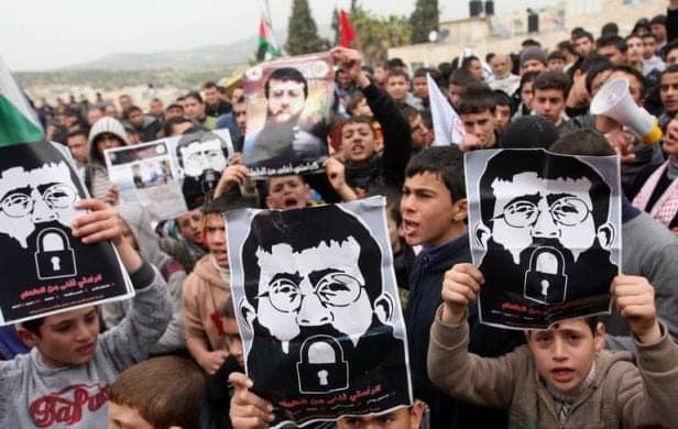 Palestinian-children-rally-for-Khader-Adnan-on-64th-day-of-hunger-strike-021912, Palestinian survivor of 66-day hunger strike pledges solidarity with striking American prisoners, Abolition Now! 