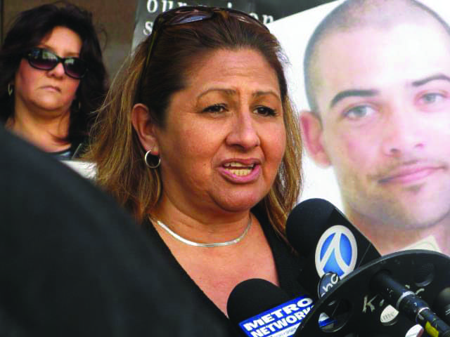 UN-petition-press-conf-Dolores-Canales-at-mics-LA-State-Bldg-032012-by-Alma-Espinosa, California prisoners challenge solitary confinement with largest hunger strike in state history, Abolition Now! 