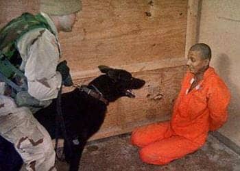 Guantanamo-prisoner-threatened-by-dog, Guantanamo Bay is hell on earth: an interview wit’ journalist Adam Hudson, Abolition Now! 