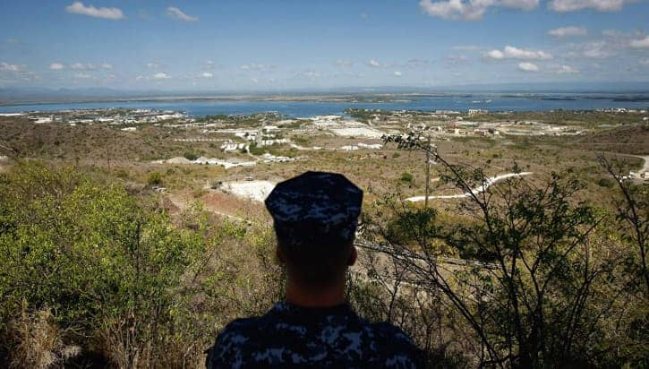 U.S.-Navy-sailor-surveys-Guantanamo-Bay-Naval-Base-by-CNN, Guantanamo Bay is hell on earth: an interview wit’ journalist Adam Hudson, Abolition Now! 