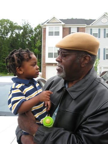 Big-Man-Howard-and-his-grandson-Amin-web, Home training: A basis for survival, Culture Currents 