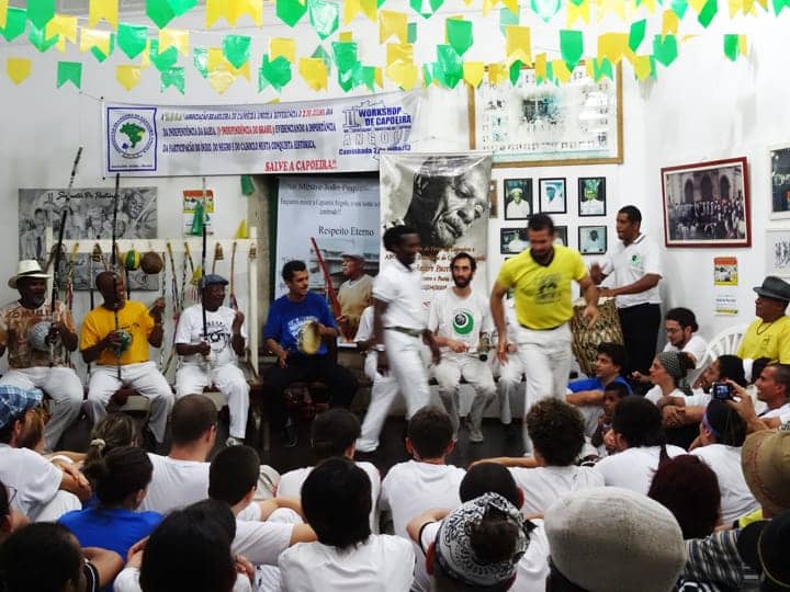 Capoeira-studio-pic-of-Vicente-Ferreira-Pastinha-founder-of-Capoeira-Angola-on-wall-Salvador-Bahia-1213-by-Wanda-web, Salvador, Bahia, Brazil: Africa in the Americas, Culture Currents 