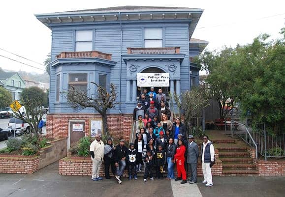 College-Prep-bldg-students-staff-on-steps, 100% College Prep: Fostering successful youth in the Bayview, Culture Currents 