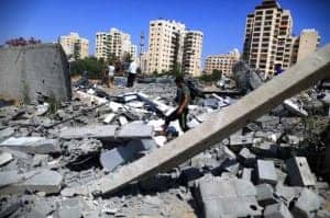 Palestinian-boy-inspects-Israeli-bombing-damage-Gaza-City-070914-by-Mohammed-Omer-300x199, Gaza: Nowhere to run, World News & Views 