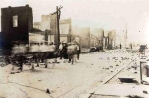 Tulsa-Race-Riot-Black-Wall-Street-after-060121-riot-by-Tulsa-Historical-Society-web-300x199, Survivors of Black Wall Street race riot still haven’t received any reparations, News & Views 