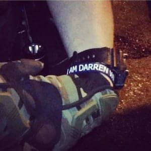 Michael-Brown-rebellion-cops-wear-I-am-Darren-Wilson-bracelets-092514-300x300, Activists renew urgent call for Ferguson police chief’s resignation after cops attack protesters again, News & Views 