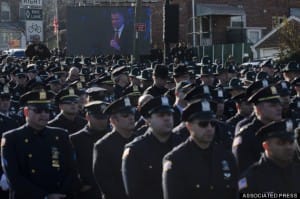 NYPD-turn-backs-on-Mayor-De-Blasio-at-Rafael-Ramos-funeral-122714-by-John-Minchillo-AP-300x199, When police die!, News & Views 