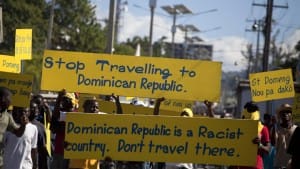 Stop-travelling-to-Dominican-Republic-DR-is-racist-Haitians-rally-by-Dieu-Nalio-Chery-AP-web-300x169, Haitian man lynched in Dominican Republic park, World News & Views 