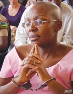 Victoire-Ingabire-handcuffed-in-court-235x300, Rwanda: Deplorable prison conditions for Victoire Ingabire, World News & Views 