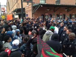 Freddie-Gray-protesters-police-at-Camden-Yards-042515-by-Colin-Campbell-300x225, Baltimore ‘shuts it down’ for Freddie Gray, News & Views 