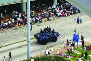 New-Orleans-Katrina-convention-ctr-police-stop-rescue-to-patrol-for-looters-by-MCT-300x201, Third Street Stroll ..., News & Views 