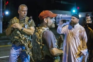 Oath-Keepers-former-cops-military-invade-Ferguson-2-days-after-Mike-Brown-murder-anniversary-081115-by-Lucas-Jackson-Reuters-300x200, Ferguson police intensify abuse, but no amount of tear gas, hatred and contempt will deter us, News & Views 