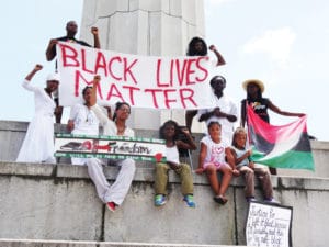 Protest-at-Robert-E.-Lee-Circle-against-Lee-all-symbols-of-white-supremacy-NOLA-Maafa-0715-by-Wanda-web-300x225, Wanda’s Picks for August 2015, Culture Currents 