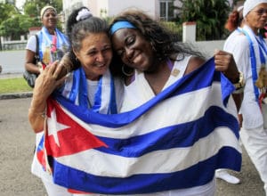 Cuban-dissidents-Aide-Gallardo-Sonia-Garro-freed-from-prison-w-Cuban-flag-march-Havana-011115-by-Reuters-300x220, Cuba to release 3,522 prisoners on the eve of Pope Francis’ visit; why can’t Obama do the same?, World News & Views 