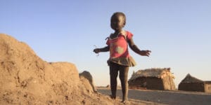 South-Sudanese-refugee-child-fleeing-conflict-stands-at-Sudanese-border-checkpoint-Joda-011714-by-Ashraf-Shazly-AFP-300x150, Give peace a chance in South Sudan: An interview with Dr. Horace Campbell, World News & Views 