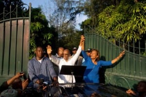 Aristide-Dr.-Maryse-Narcisse-Lavalas-presidential-nominee-on-pickup-truck-outside-his-home-093015-by-Dieu-Nalio-Chery-AP-300x200, Election 2015: The fight for voting rights and sovereignty in Haiti, World News & Views 