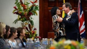 Jamaica-PM-Portia-Simpson-Miller-British-PM-David-Cameron-hug-as-talks-end-Jamaica-House-100915-by-PA-300x169, David Cameron’s visit to Jamaica: Amusing and dangerous, World News & Views 