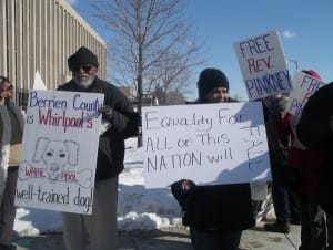 Free-Rev.-Pinkney-rally-outside-Berrien-County-Courthouse-after-bail-release-hearing-0315-by-Sandy-Reid-Peoples-Tribune-300x226, Rev. Pinkney, marking one year in prison, endures the routine lies of prison officials, Abolition Now! 