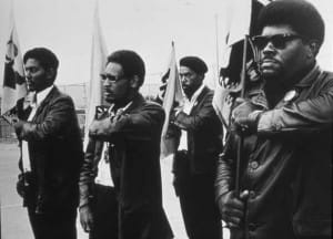Black-Panthers-Drill-w-Big-Man-Free-Huey-Rally-DeFremery-Park-0768-by-Pirkle-Jones-300x216, Mumia Abu-Jamal: The genius of Huey P. Newton, Culture Currents 