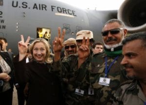 Hillary-Clinton-Libyan-soldiers-claim-victory-after-Qaddafi-assassination-1011-by-Kevin-Lamarque-Reuters-300x217, Exposing the Libyan agenda: a closer look at Hillary’s emails, World News & Views 