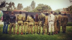 african-Hebrew-soldiers-public-protest-prohibited-turn-backs-to-camera-call-to-refuse-enlistment-300x169, Emigres demand answers after first African American dies during Israeli army service, World News & Views 