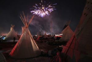 Standing-Rock-fireworks-Oceti-Sakowin-Camp-celebrates-DAPL-permit-denial-120416-by-Scott-Olson-web-300x202, Temporary victory at Standing Rock, News & Views 