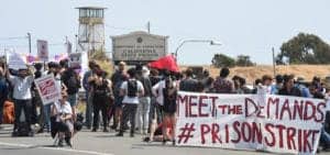 National-Prison-Strike-San-Quentin-West-Gate-crowd-Meet-the-Demands-PrisonStrike-banner-guard-tower-082518-by-G.-Sharat-Lin-web-300x141, Reports back from the first week of the 2018 National Prison Strike, Abolition Now! 