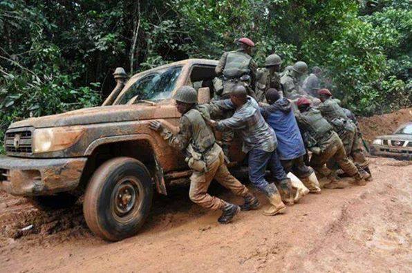 Soldiers-push-Pres.-Kabilas-vehicle-out-of-the-mud-on-a-Congolese-road, ‘Evacuate the coffee’: A white supremacist classic from US diplomats in DRC, World News & Views 