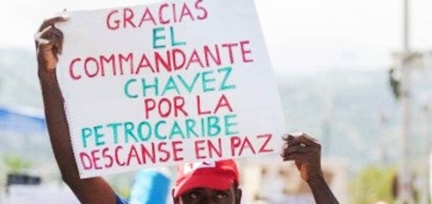 Thank-you-Commandante-Chavez-for-PetroCaribe.-Rest-in-peace’-sign-in-Haitian-Kreole-held-by-protester-0219, As U.S. intervention germinates in Venezuela, we must not forget the implications for Haiti, World News & Views 