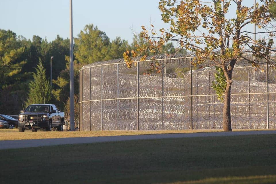 SC-McCormick-Correctional-Institution-3-fences-lined-top-to-bottom-with-razor-wire-by-Greenwood-Index-Journal, After South Carolina prisoner brutalized, guard recommends writing to the Bay View, World News & Views 
