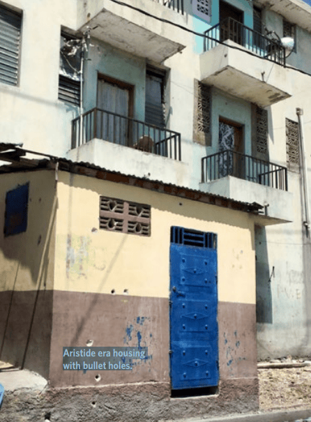 Aristide-era-housing-in-Lasalin-by-Judith-Mirkinson, The Lasalin Massacre and the human rights crisis in Haiti, World News & Views 