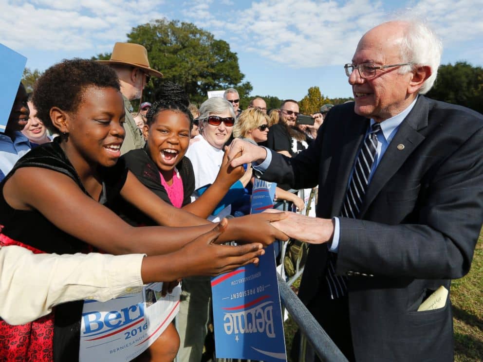 Bernie-Sanders-welcomed-by-Black-youngsters-on-visit-to-Jenkins-Orphanage-in-North-Charleston-S.C.-112115-by-Mic-Smith-AP, Bernie’s heart – and ours, News & Views 