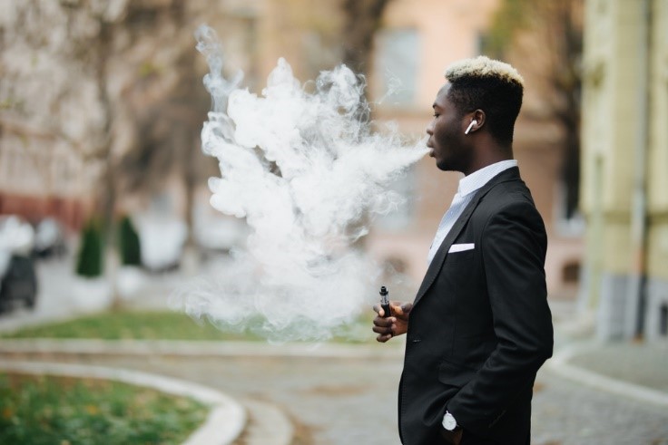 Black-young-man-vaping, Talking with kids about the dangers of e-cigarettes, Culture Currents 